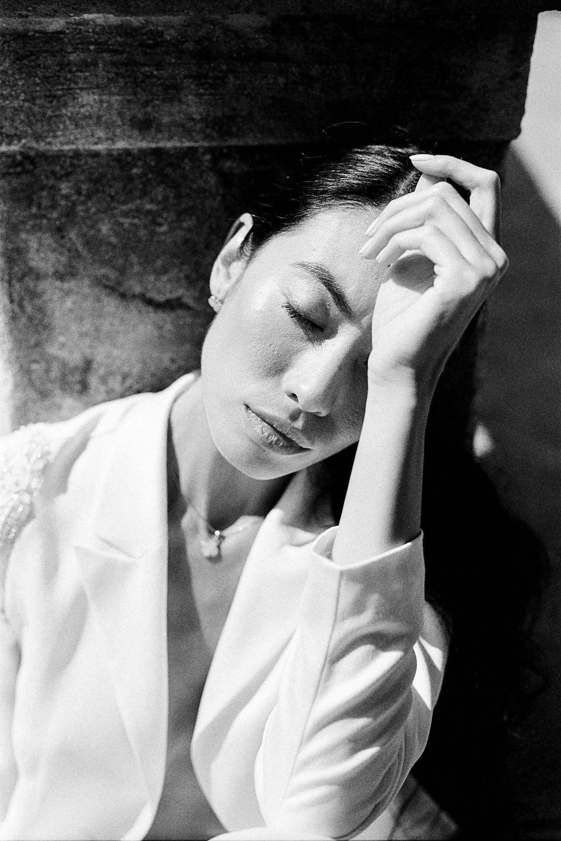 Grayscale Photo of Woman in White Collared Shirt